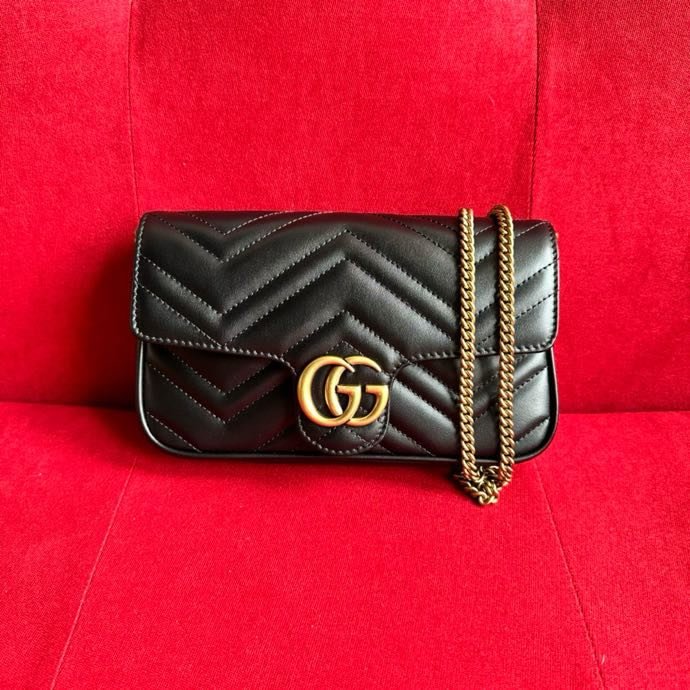 A bag women's GG Marmont at black skin 21 cm
