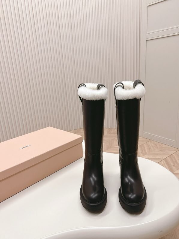 Leather women's boots on fur
