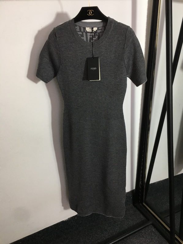 Fitting knitted dress from short sleeves
