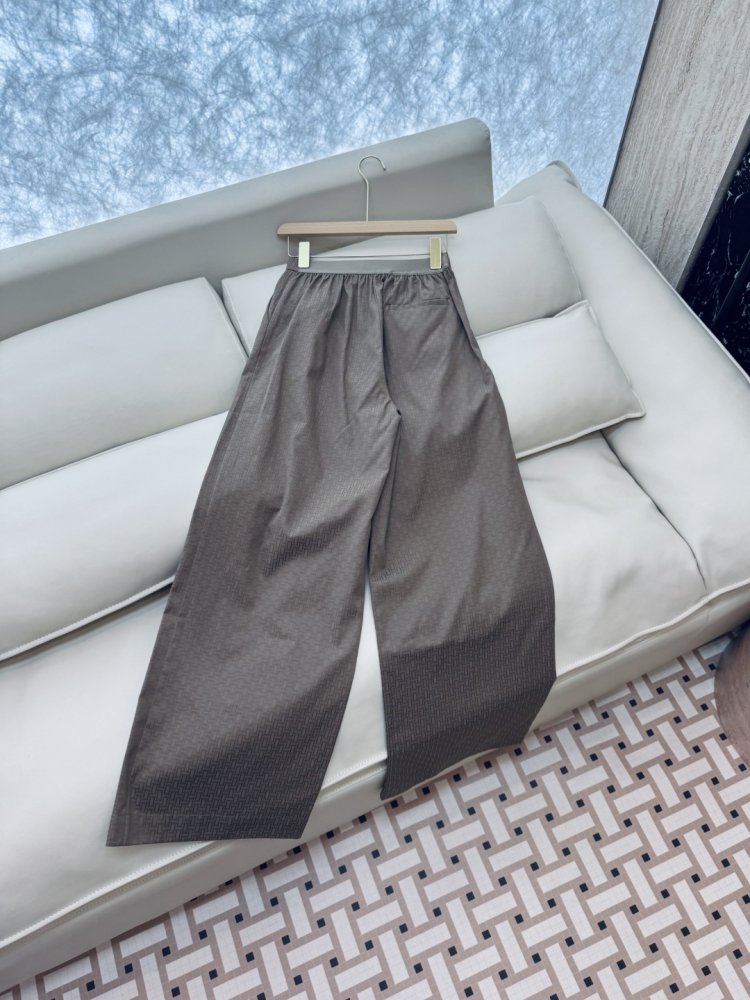 Широкі брюки з темним візерунком фото 4