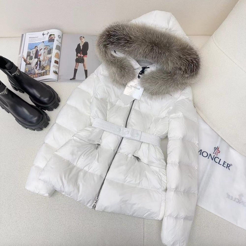 Short female Down jacket from hood of fur raccoon