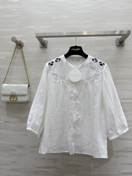 Linen blouse from shortened sleeves