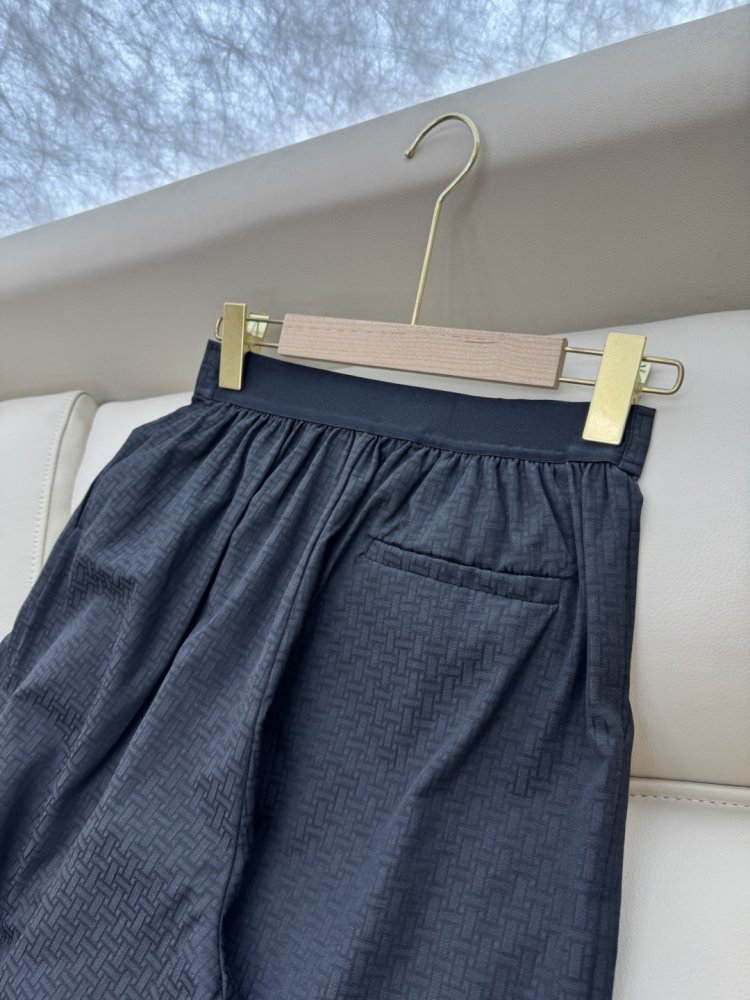 Широкі брюки з темним візерунком фото 7