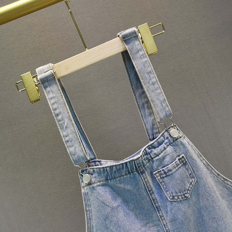 Короткий жіночий джинсовий комбінезон, вільний, з високою талією фото 3