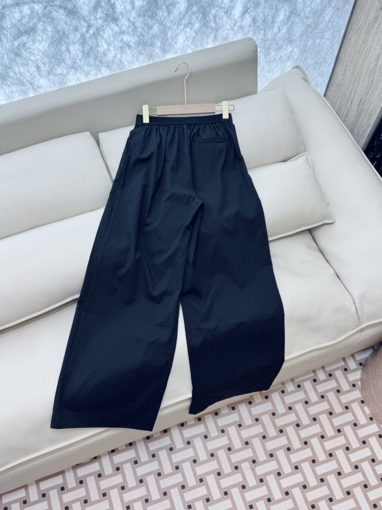 Широкі брюки з темним візерунком фото 4