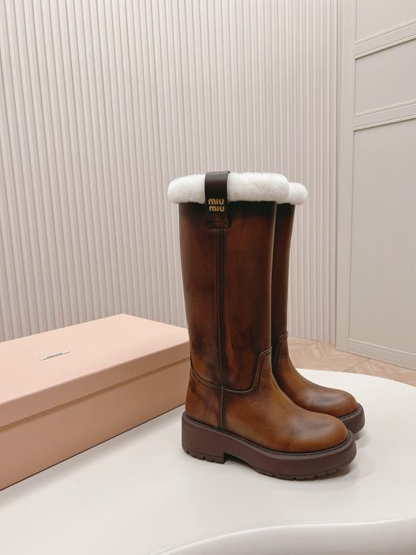 Leather women's boots on fur
