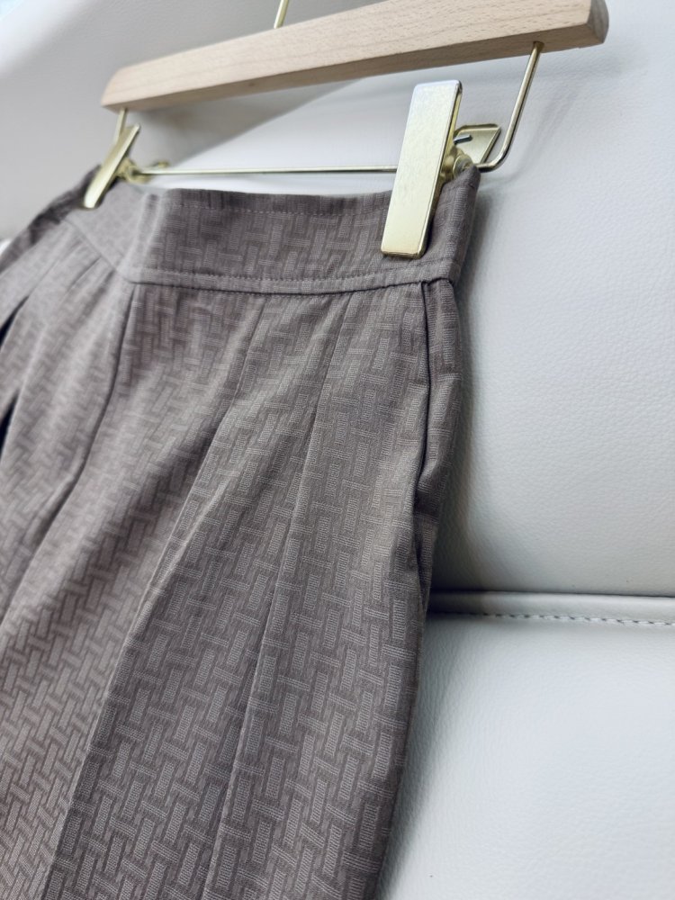 Широкі брюки з темним візерунком фото 6