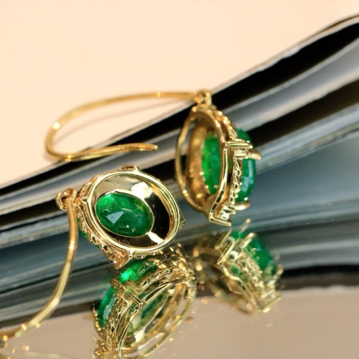 Gold earrings from emeralds фото 5