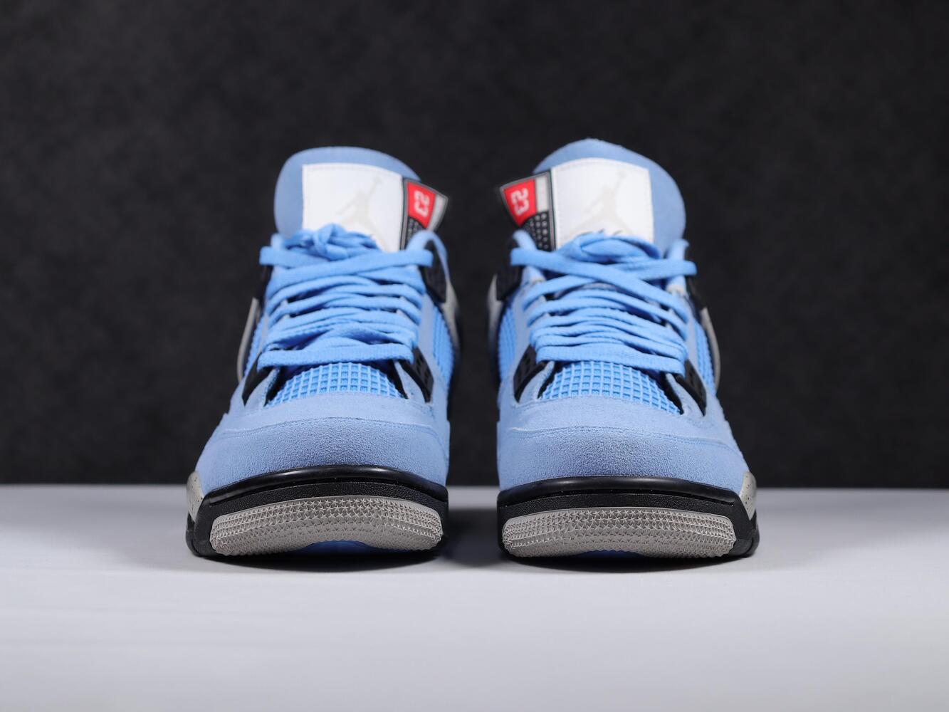 Кроссовки Air Jordan 4 Retro University Blue CT8527-400 фото 5