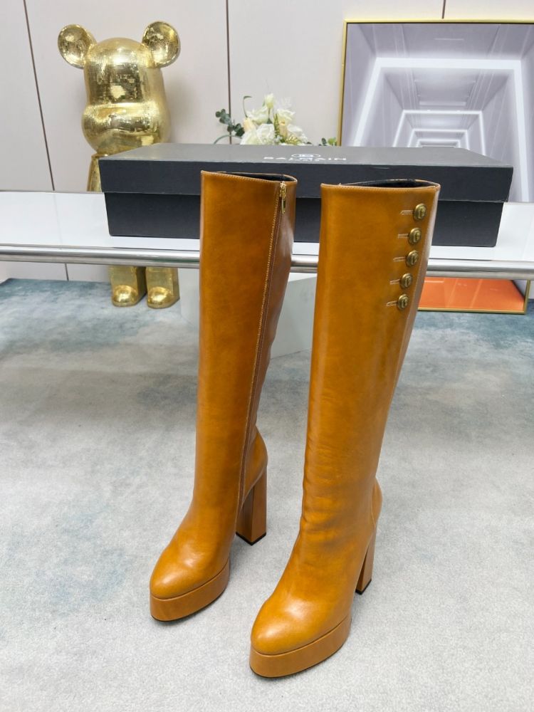 High leather boots on massive heel