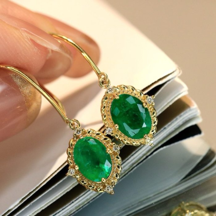 Gold earrings from emeralds фото 4