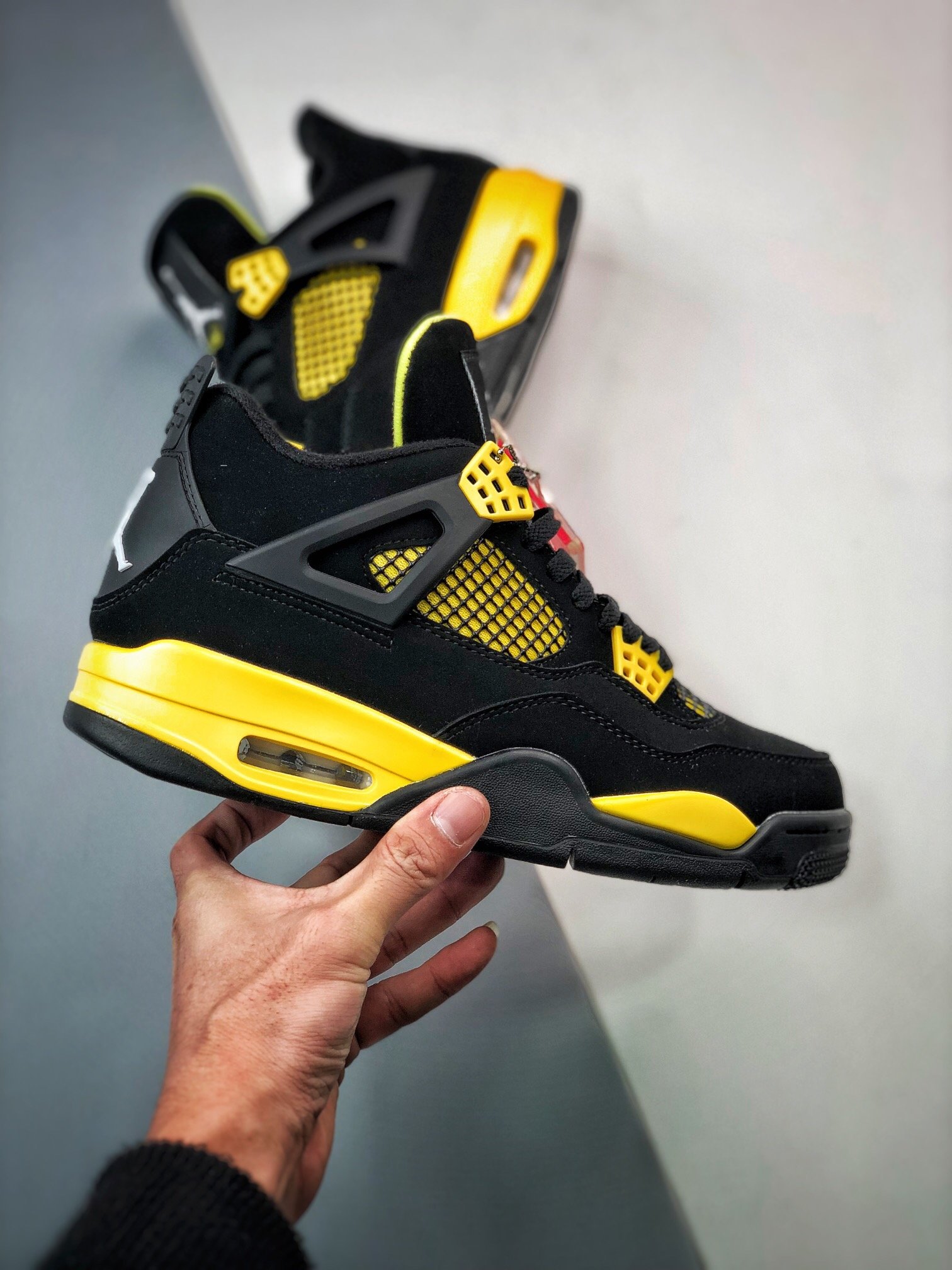 Кросівки Air Jordan 4 Retro Thunder DH6927-017 фото 4