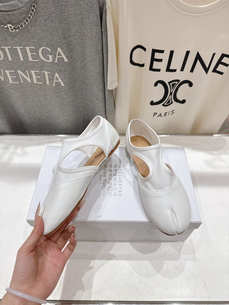 Балетки tabi с раздвоенным носком фото 4