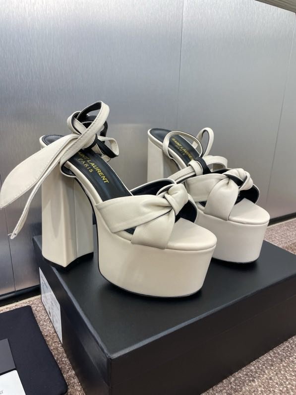 Sandals on platform from high heel