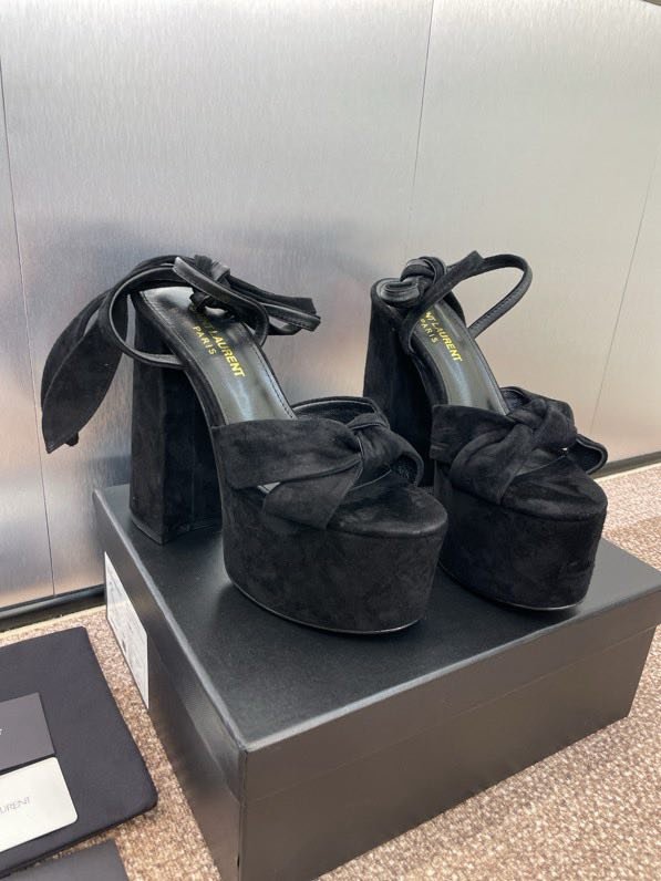 Sandals on platform from high heel