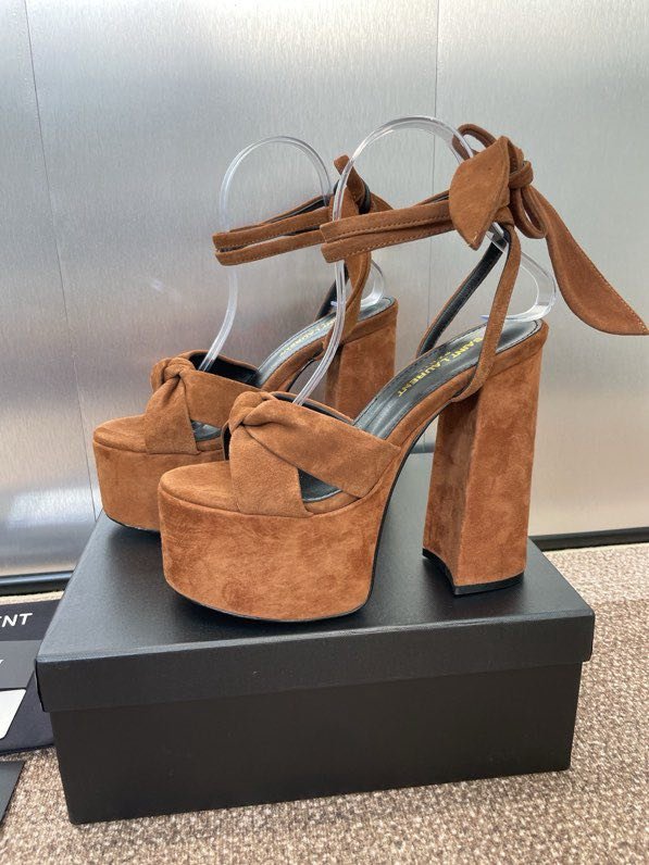 Sandals on platform from high heel