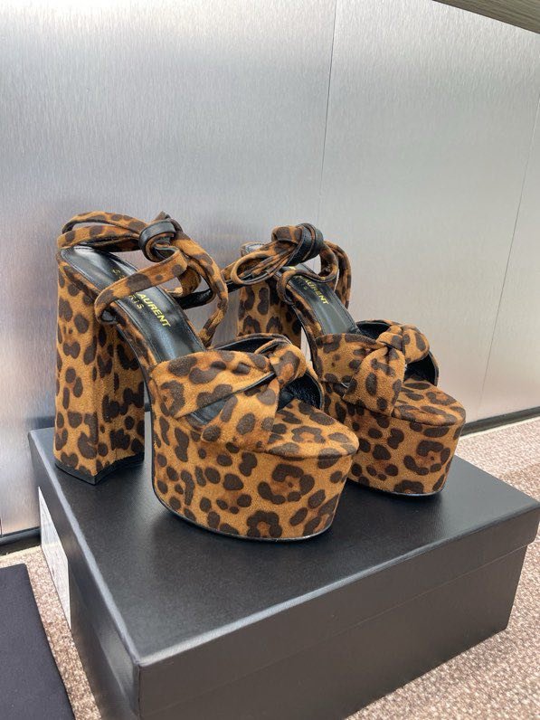 Sandals on platform from high heel