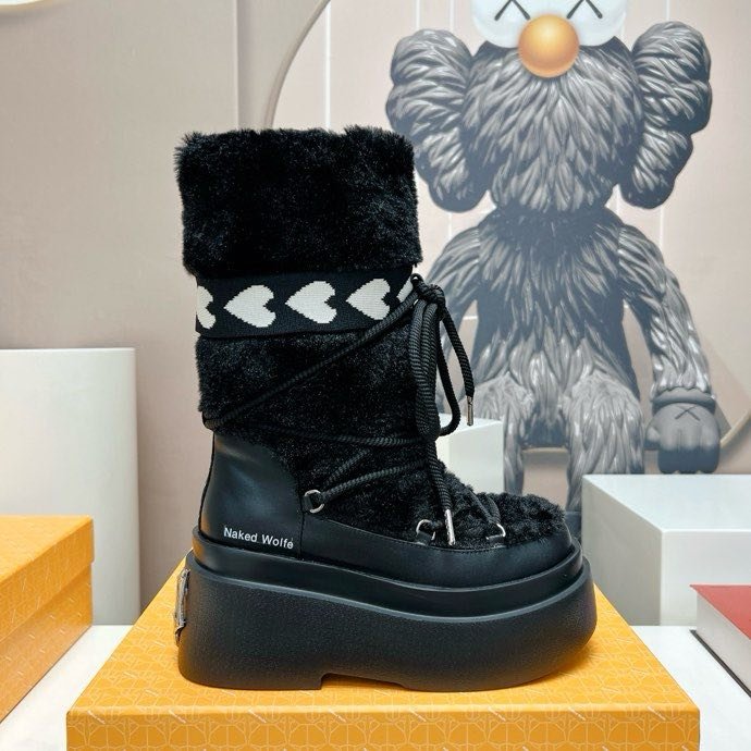 Boots on platform with lacing