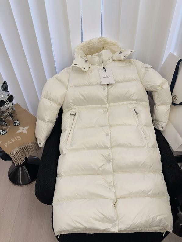 Довга куртка пуховик з капюшоном