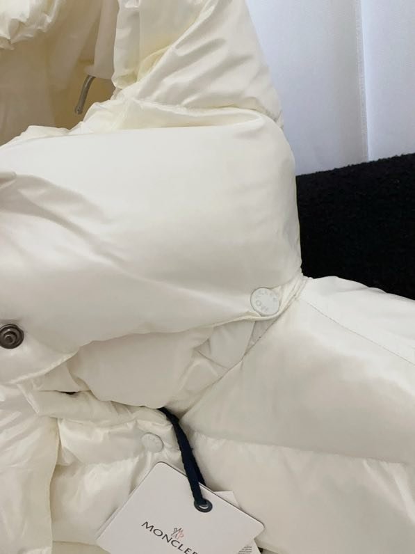 Довга куртка пуховик з капюшоном фото 6