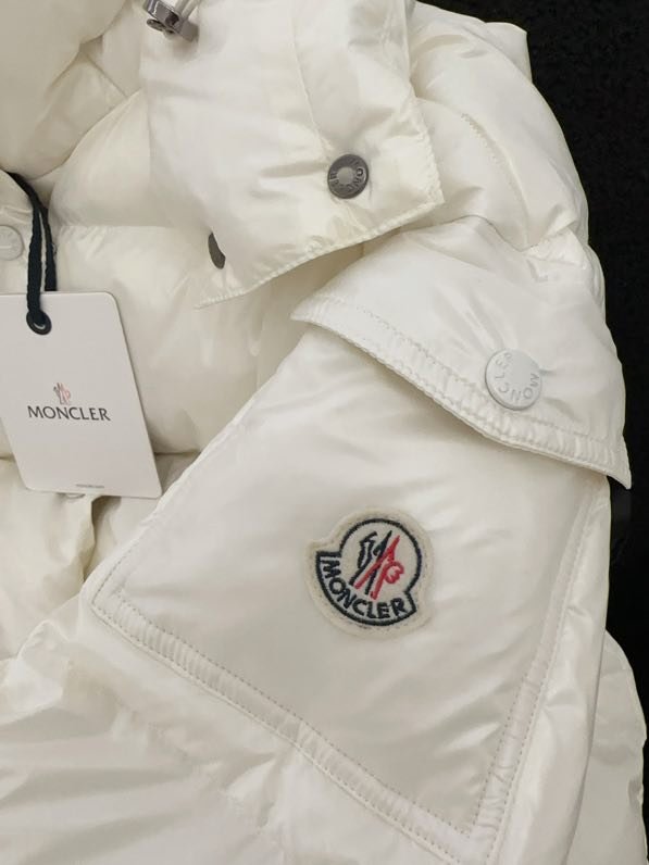 Довга куртка пуховик з капюшоном фото 7