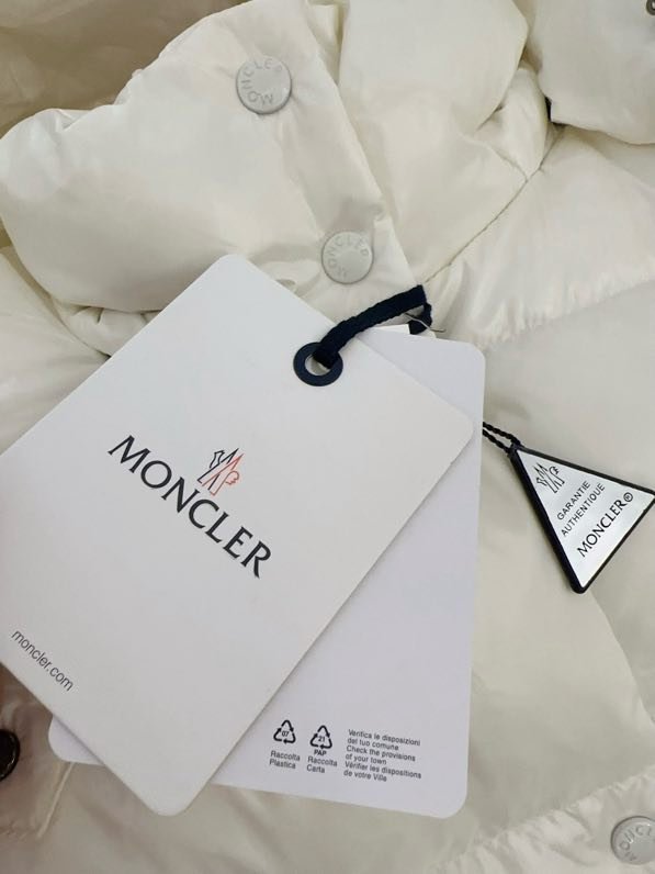 Довга куртка пуховик з капюшоном фото 8