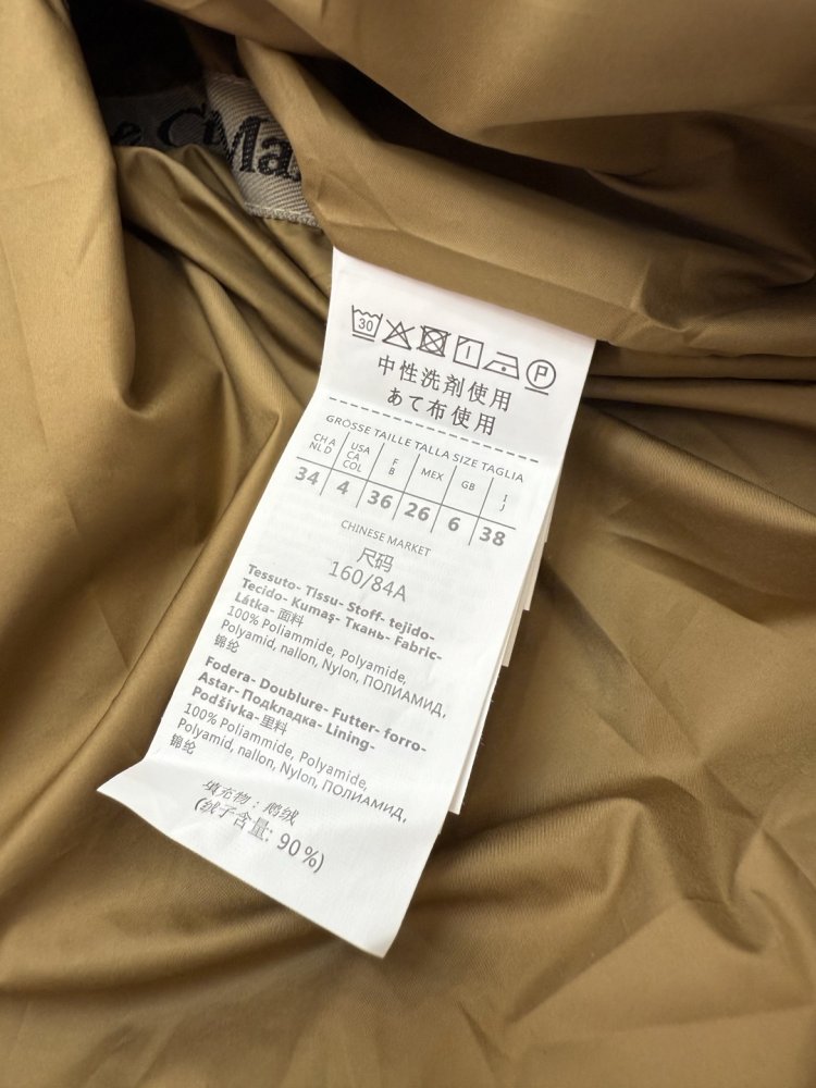 Довга куртка пуховик з капюшоном фото 9