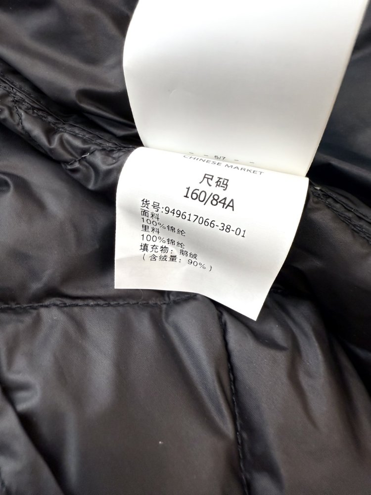 Довга куртка пуховик з поясом і застібкою блискавкою фото 9