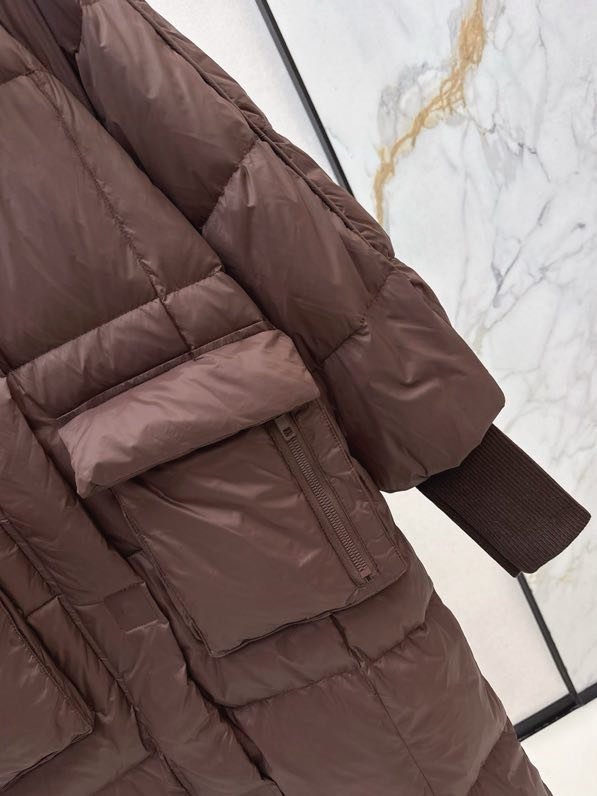 Довга пухова куртка з капюшоном фото 9