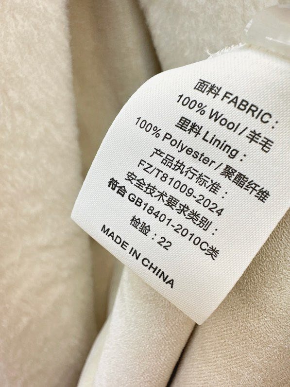 Довге пальто з коміром з лисячого хутра фото 7