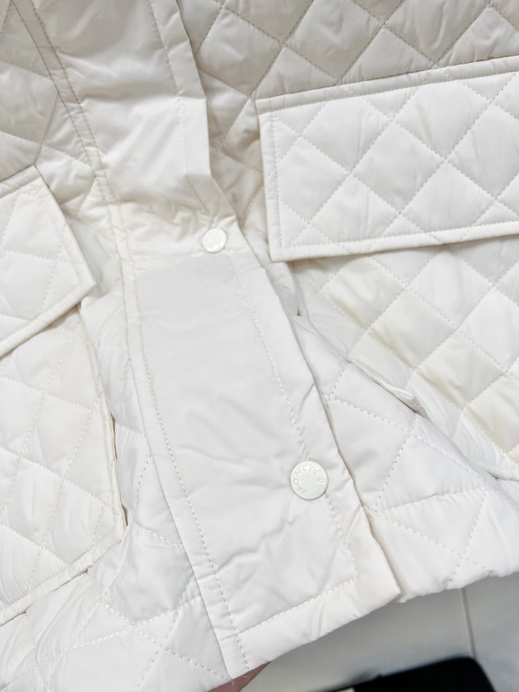 Довге пухова пальто жіноче фото 10