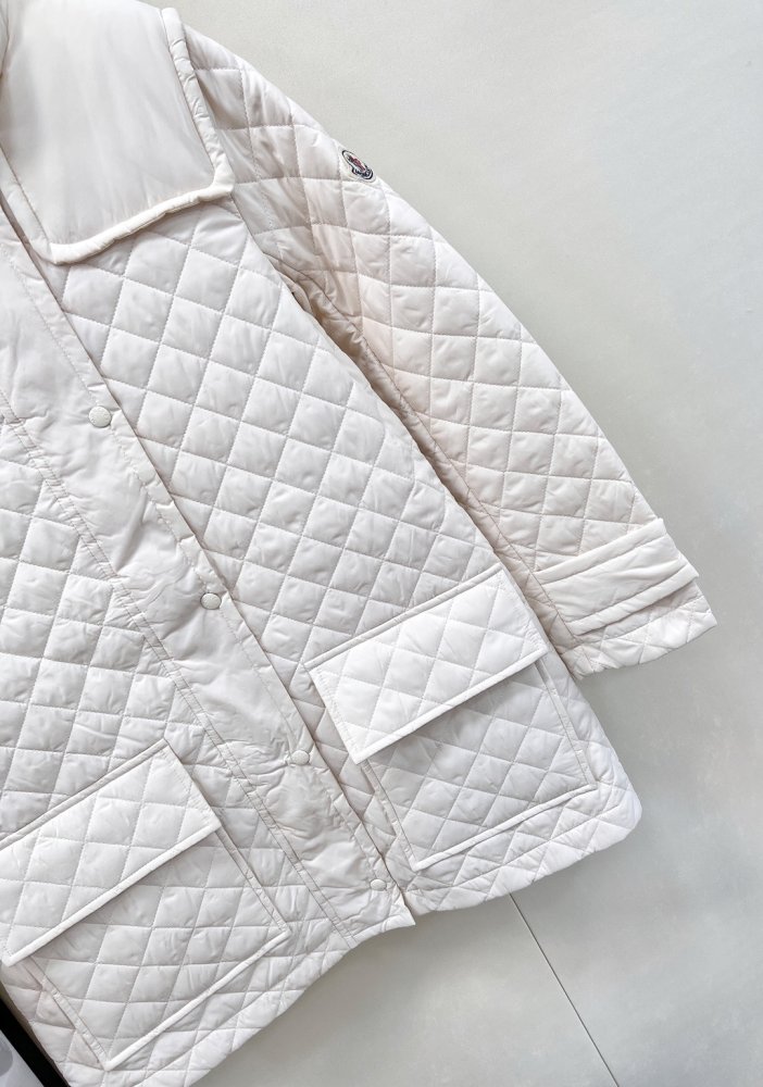 Довге пухова пальто жіноче фото 5