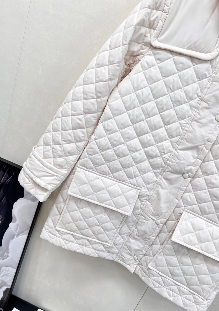 Довге пухова пальто жіноче фото 6