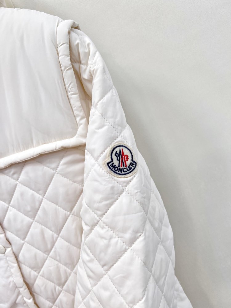 Довге пухова пальто жіноче фото 7