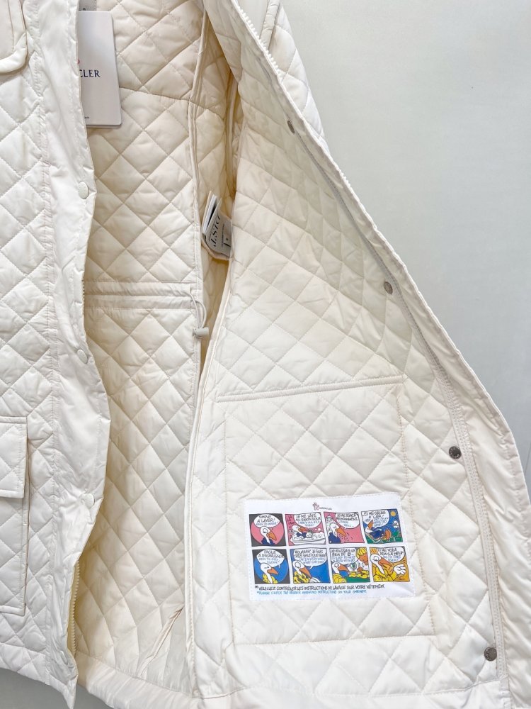 Довге пухова пальто жіноче фото 9