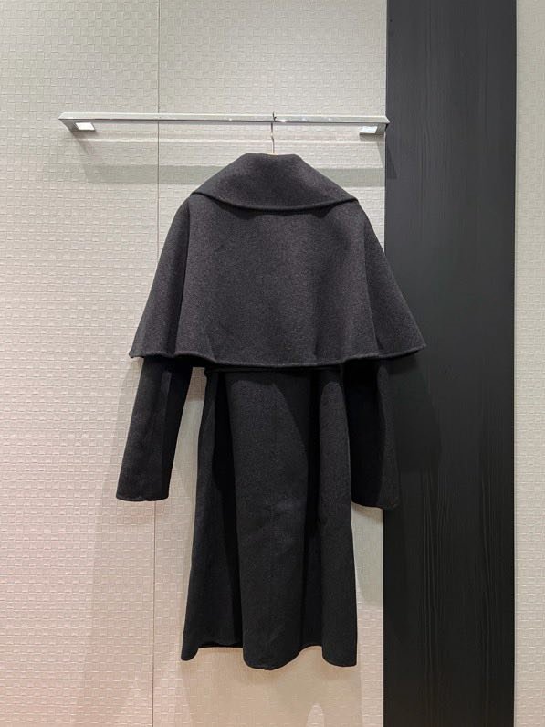 Длинное шерстяное пальто с накидкой шалью фото 8