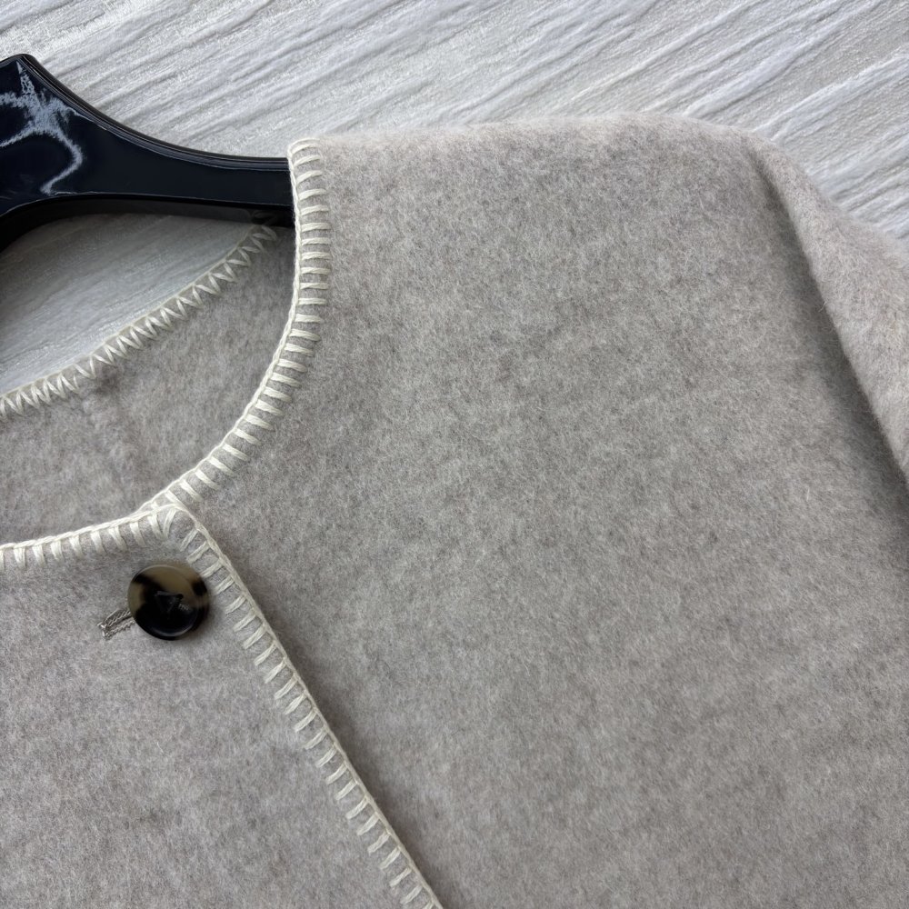 Длинное шерстяное пальто фото 5