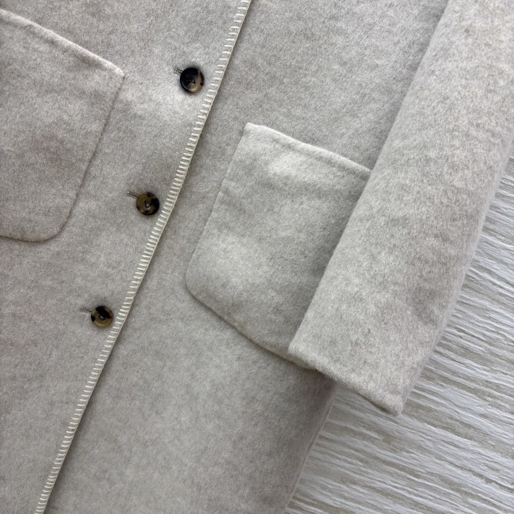 Длинное шерстяное пальто фото 7