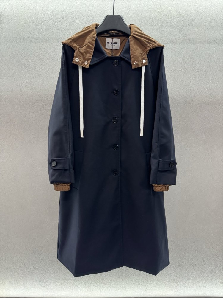 A long single-breasted trench coat