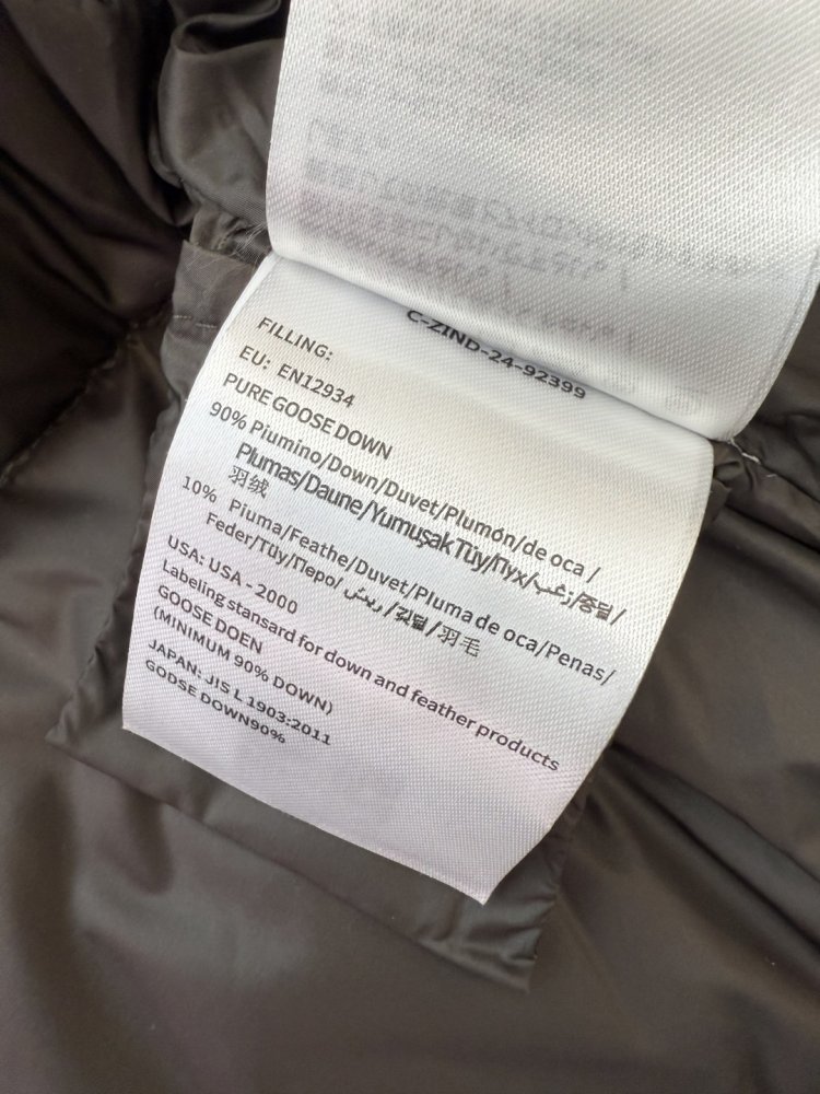 A long fitted Down jacket from side lightning фото 9