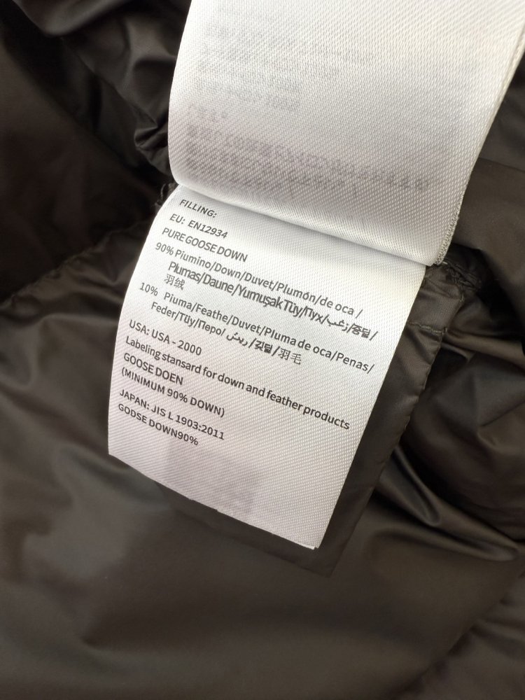 A long fitted Down jacket from side lightning фото 9