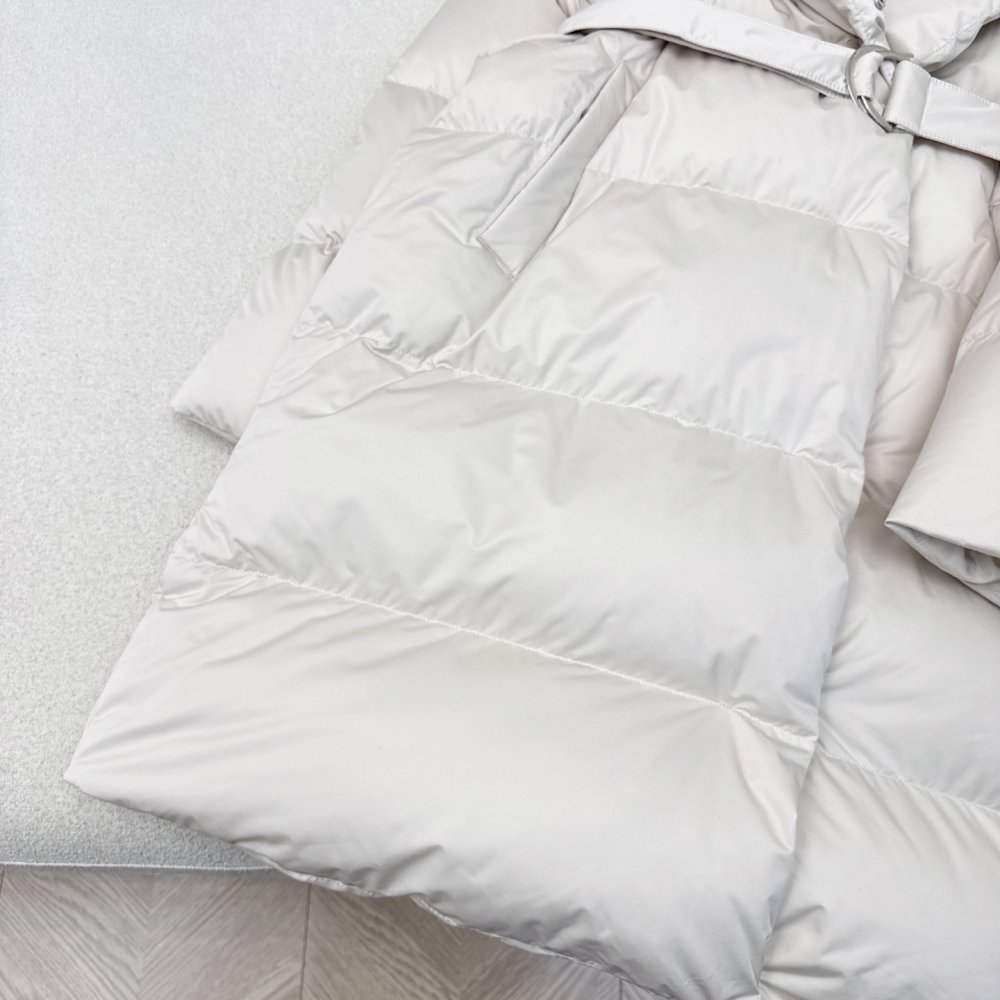 Длинный пуховик с воротником стойкой фото 5