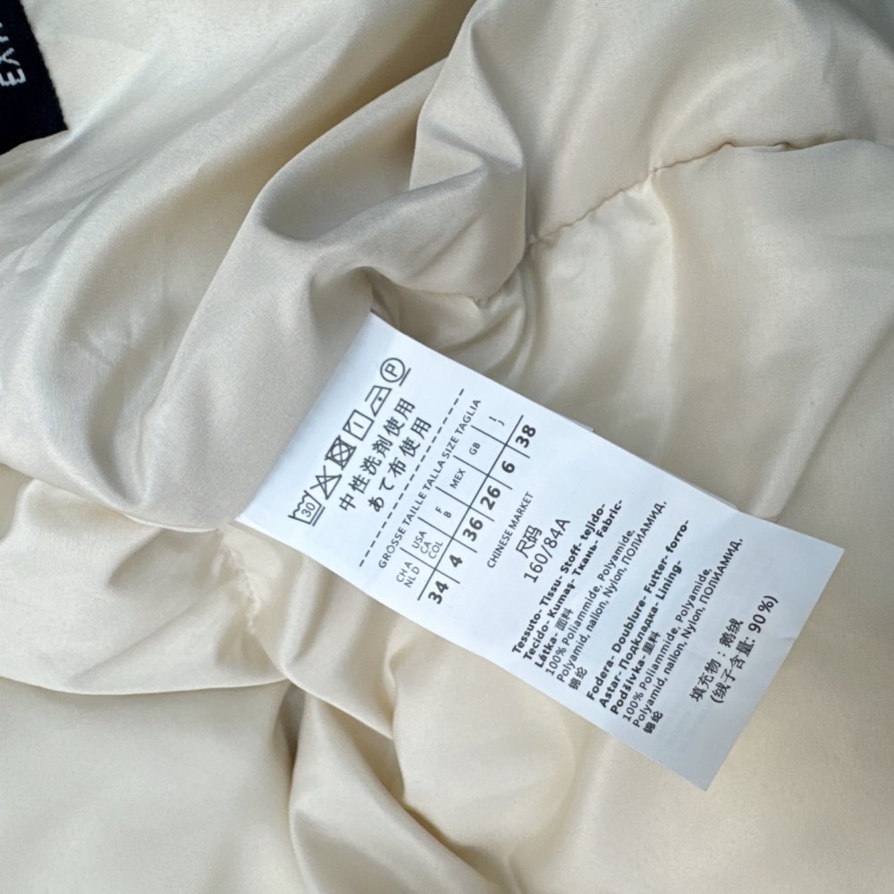 Длинный пуховик с воротником стойкой фото 9