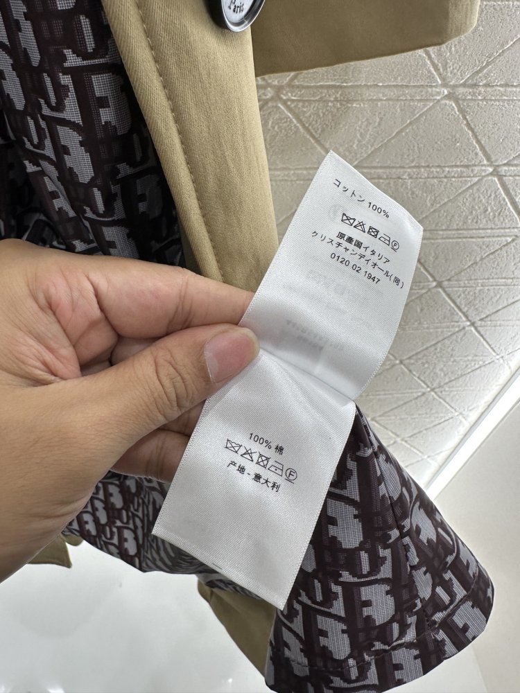 Довгий тренчкот з поясом і вилогами фото 9