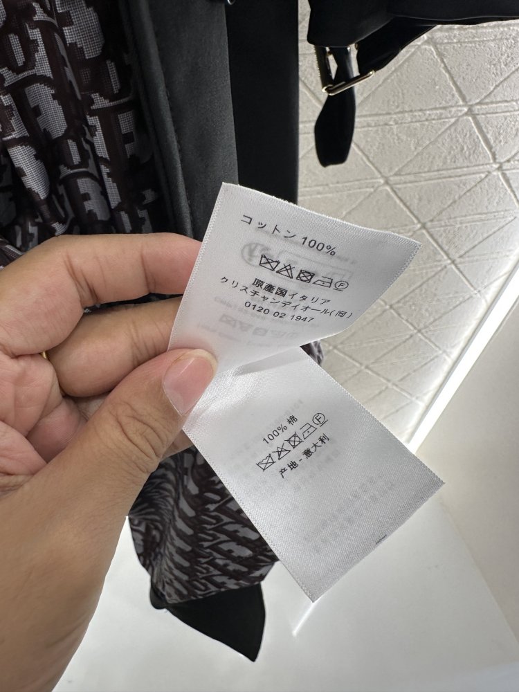 Довгий тренчкот з поясом і вилогами фото 9