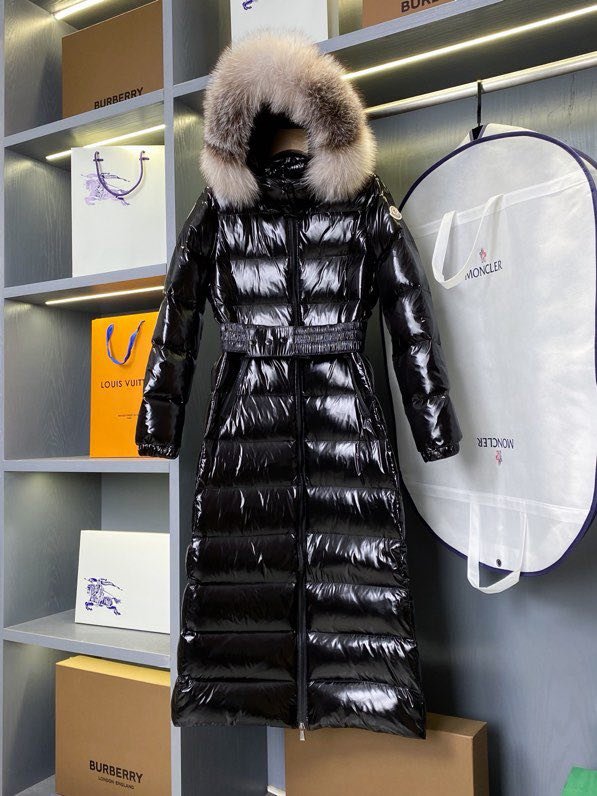 A long female Down jacket from collar of fox fur