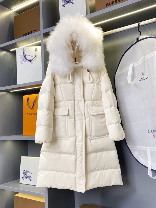 A long female Down jacket from collar of fox fur