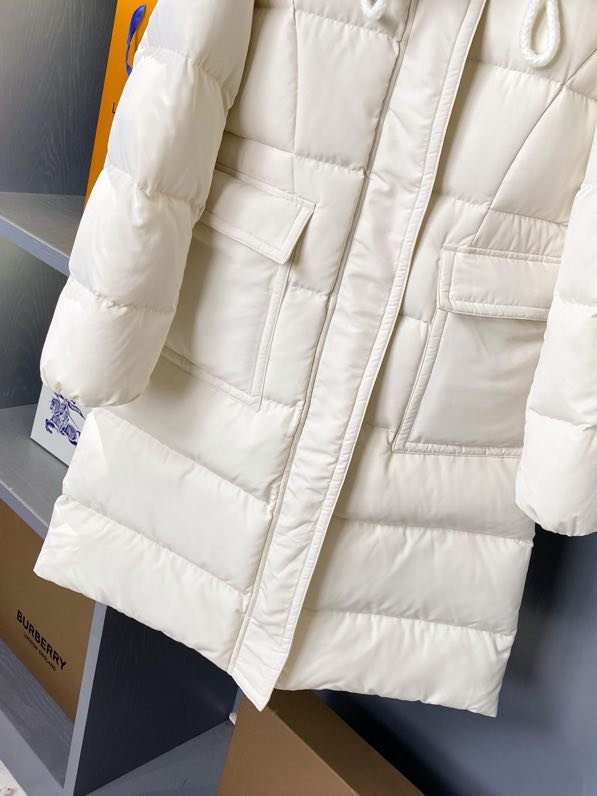 A long female Down jacket from collar of fox fur фото 9