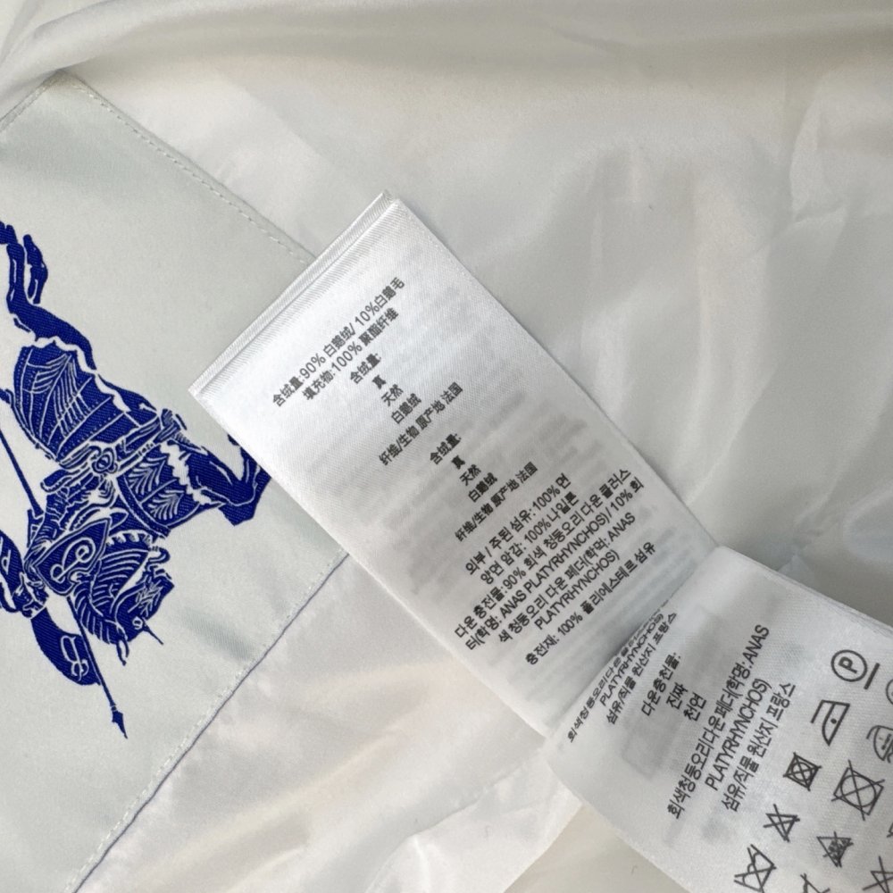 Двубортный длинный пуховик женский фото 8