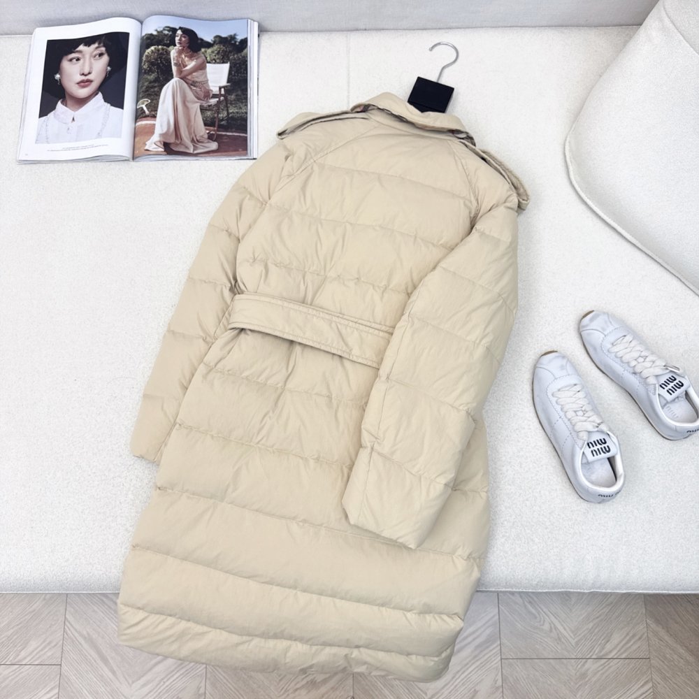 Двубортный длинный пуховик женский фото 9